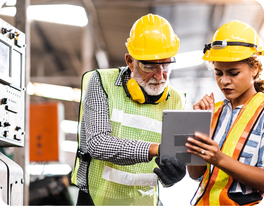 manufacturing employees using tablet