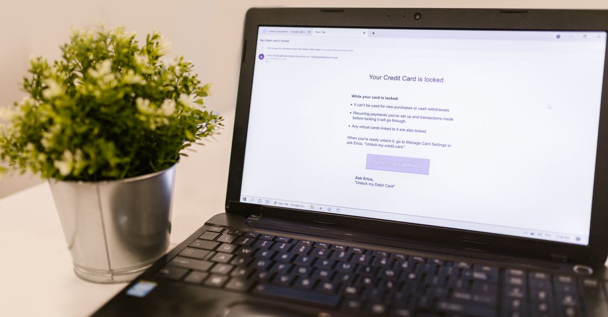 Business professional reviewing a suspicious email on a laptop, representing business email compromise fraud