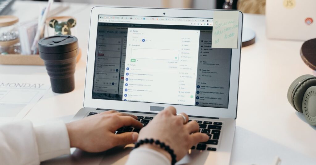Small business office employee checking email security alerts on a laptop