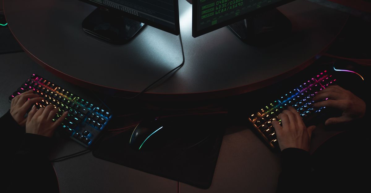 IT security analyst monitoring cybersecurity alerts on a dashboard
