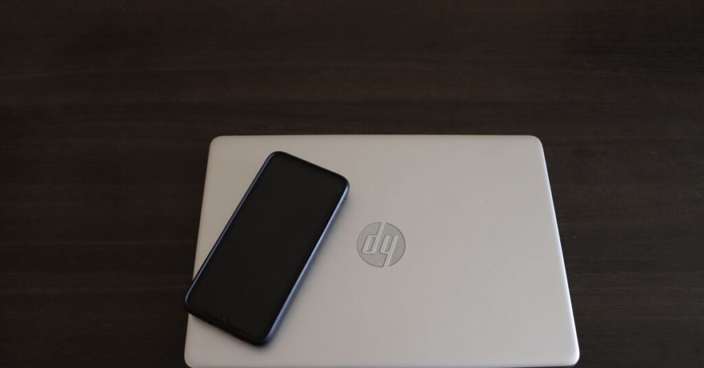 IT technician updating a Windows 11 laptop in a small business office