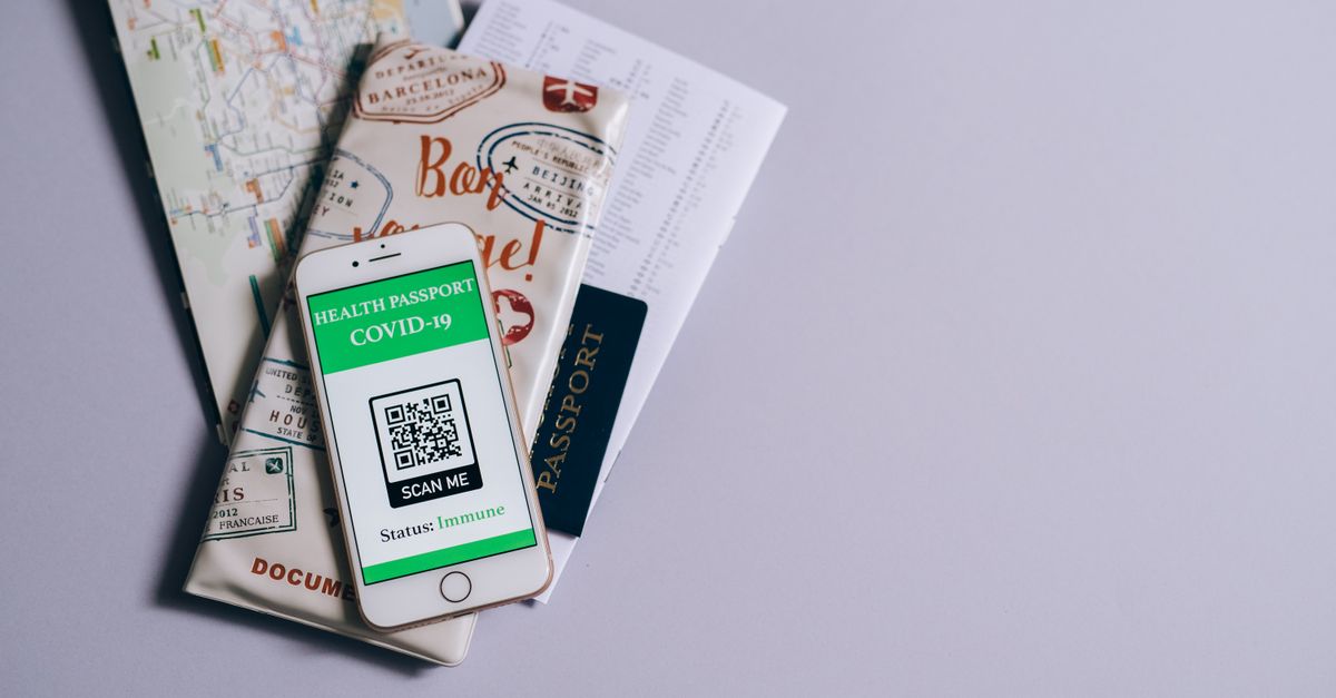 A person using a smartphone to scan a QR code, illustrating the risk of QR code phishing attacks